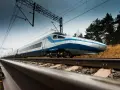 Nowoczesny pociąg Pendolino mknie po torach, gotowy do podróży z Warszawy do Sopotu.